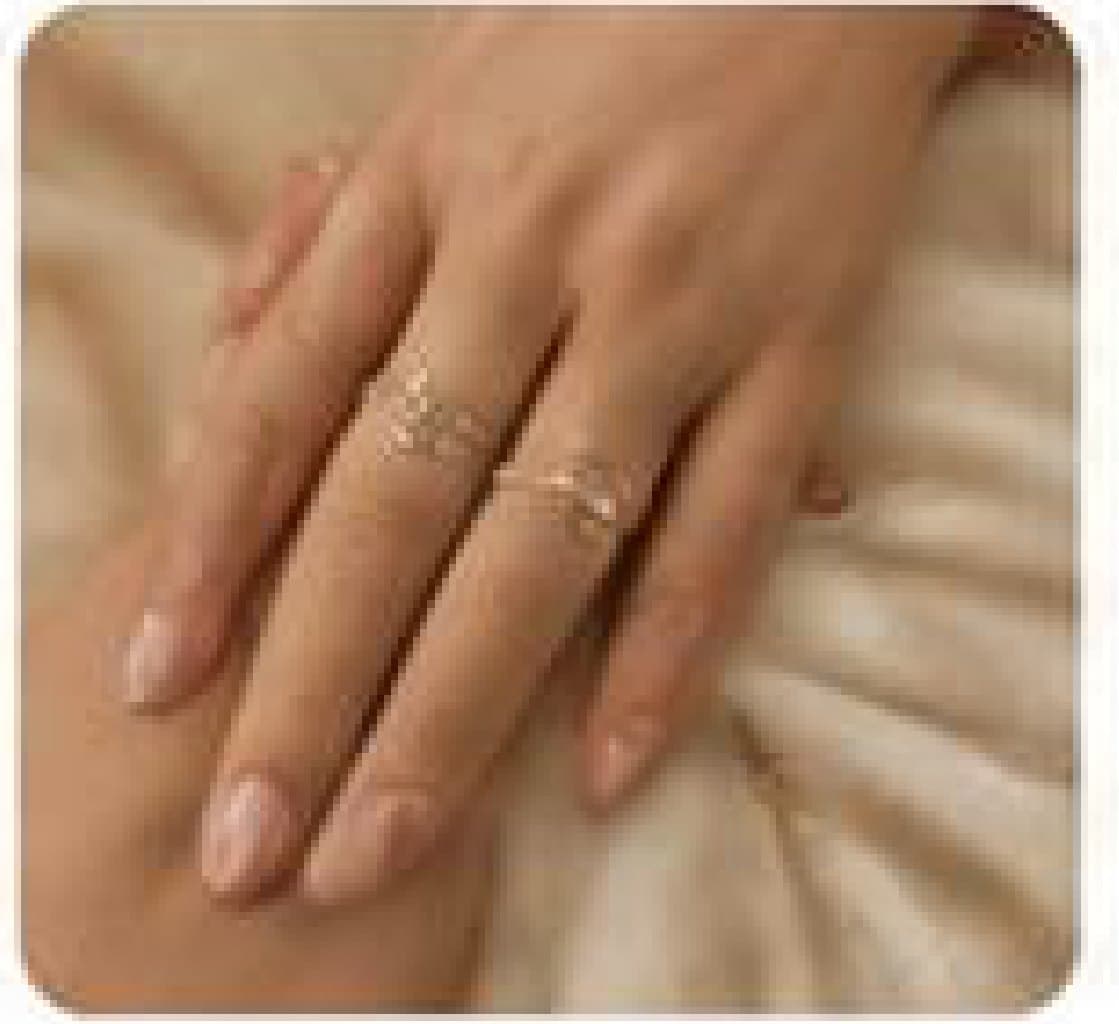 Stacked diamond bands on a hand